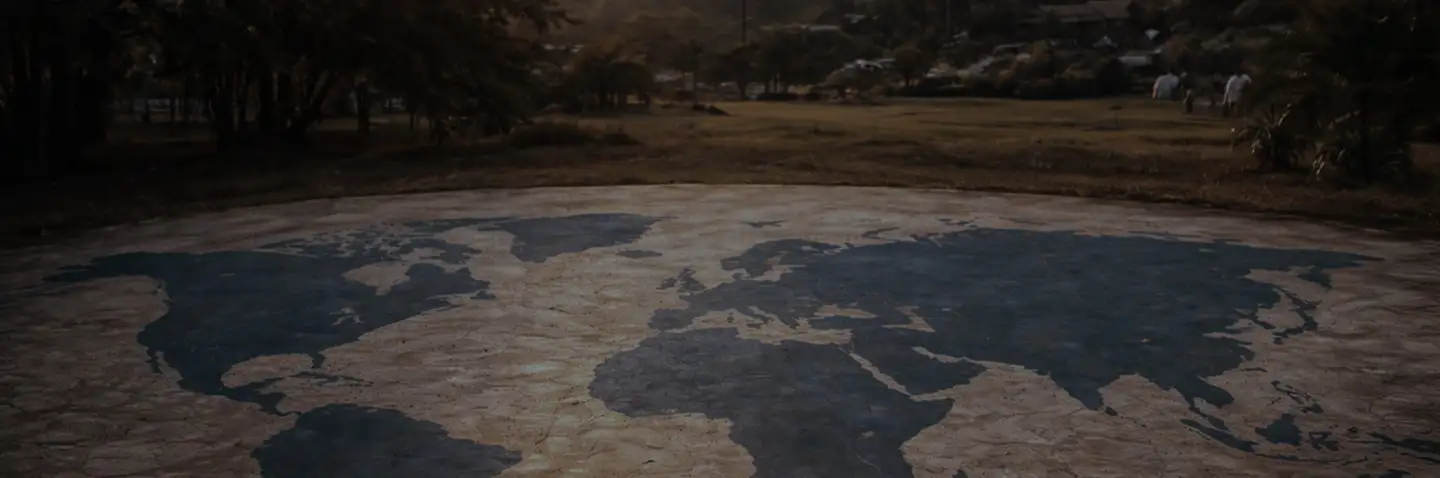 A world map etched into the ground representing global mission outreach